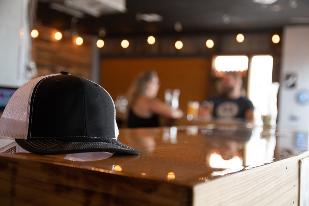 hat on a bar